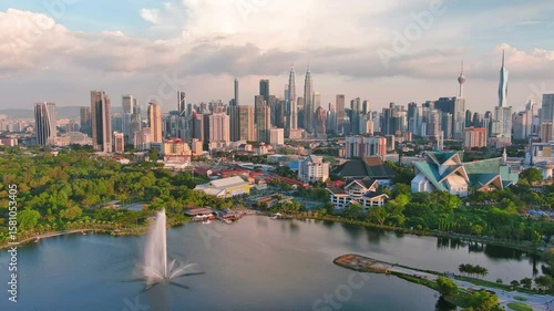 Kuala Lumpur, Malaysia: Aerial view of capital city of Malaysia, modern skyline at sunset, perfect for travel, business, or development projects - landscape panorama of Southeast Asia from above
