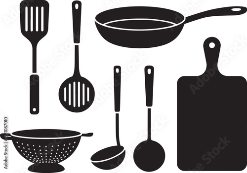 Black kitchen utensils including a spatula slotted spoon ladle colander frying pan and cutting board