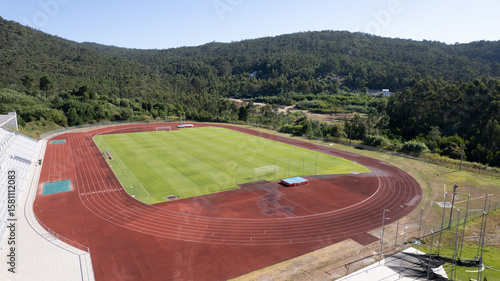 Aerial view of the Manuela Machado Municipal Stadium, nearby Viana do Castelo, Portugal. Consisting of a stadium football field with synthetic turf and an athletics track with ten tracks.