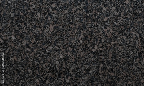 Dark brown cork texture with fine shredded granules, creating a rich and natural background. Perfect for eco-themed designs, sustainable materials, or realistic texture overlays.