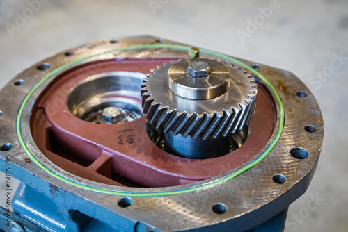 Canvas-taulu Close up of gearbox showing rotating gears and mechanical components