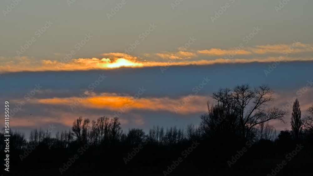 Fototapeta premium Colorful winter evening sky over the marsh