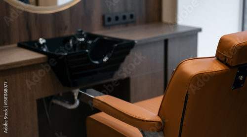 Canvas-taulu Modern barber shop interior with stylish chair and sink, retro tonning