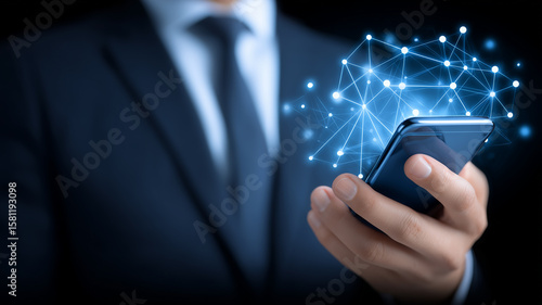 Wallpaper Mural Businessman Holding Smartphone Revealing Futuristic Digital Network Connections and Data Flow
 Torontodigital.ca