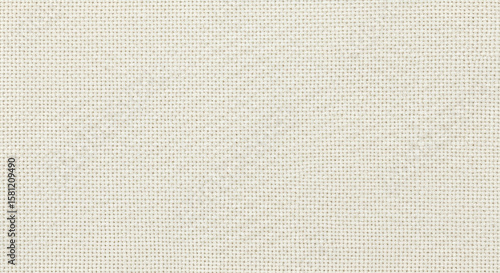 Subtle Texture: Close-Up of Woven Fabric with Neutral Tones, Perfect for Backgrounds and Surface Design Projects.