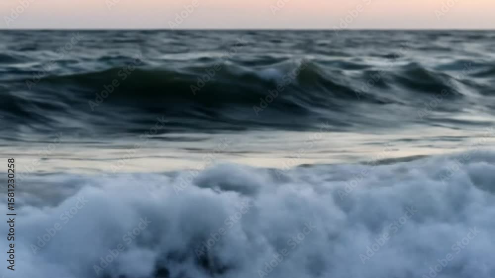 Ocean waves at sunset Ocean waves at sunset