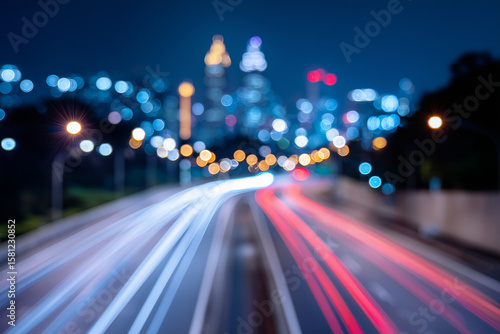 Wallpaper Mural Night cityscape highway with blurred light trails and bokeh city background Torontodigital.ca