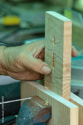 Woodworking Hand Detail with Precision Sawing