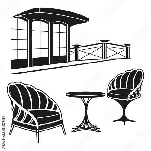 Outdoor seating area with chairs and table in front of a building facade with windows and railing