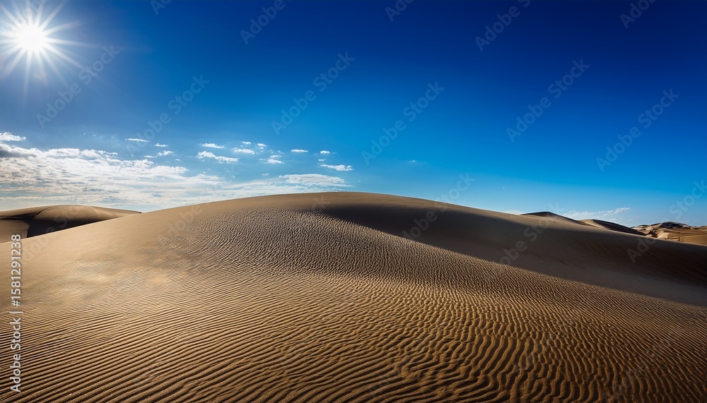 Naklejka premium metallic sand dunes shifting under a bright blue sky displaying liquid chrome texture