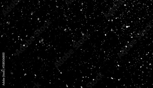 Abstract black background with scattered white particles