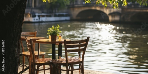 Parisian Riverfront Cafe: Tranquil Morning by the Seine