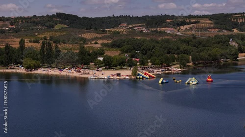 Aerial drone view of man made beaches at Albufeira do Azibo near Braganca, Portugal