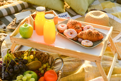 Picnic with tasty food and ...