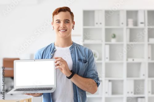 Young businessman with blan...