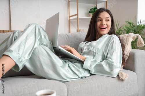 Young woman in green pajama...