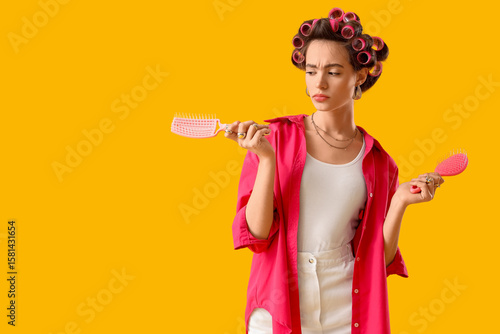 Thoughtful young woman with...