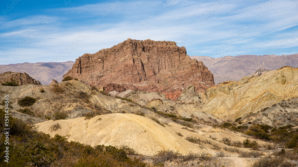 Naklejka premium BEAUTIFUL MOUNTAIN LANDSCAPE, COLORFUL ROCKY, ARID, WITH YELLOW ROCKS AND RED ROCKS, IN SANTA MARIA CATAMARCA ARGENTINA