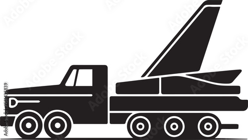 Black silhouette of a truck transporting a grand piano