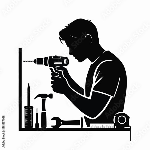 Silhouette of a handyman drilling a hole with a power drill and tools