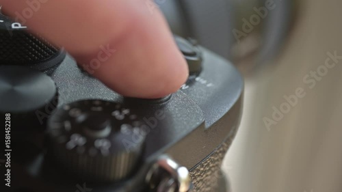 Close up of photo video camera in action