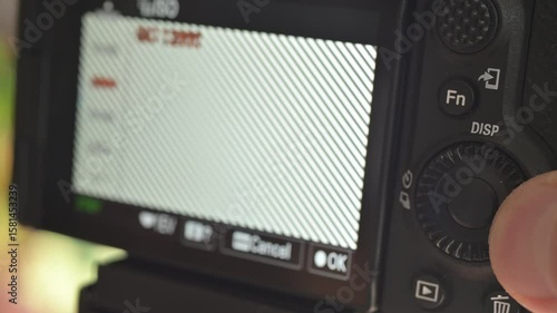 Close up of photo video camera in action
