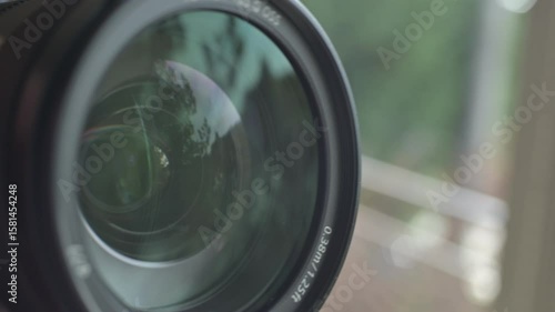 Close up of photo video camera in action
