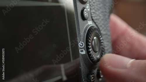Close up of photo video camera in action
