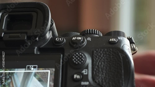 Close up of photo video camera in action