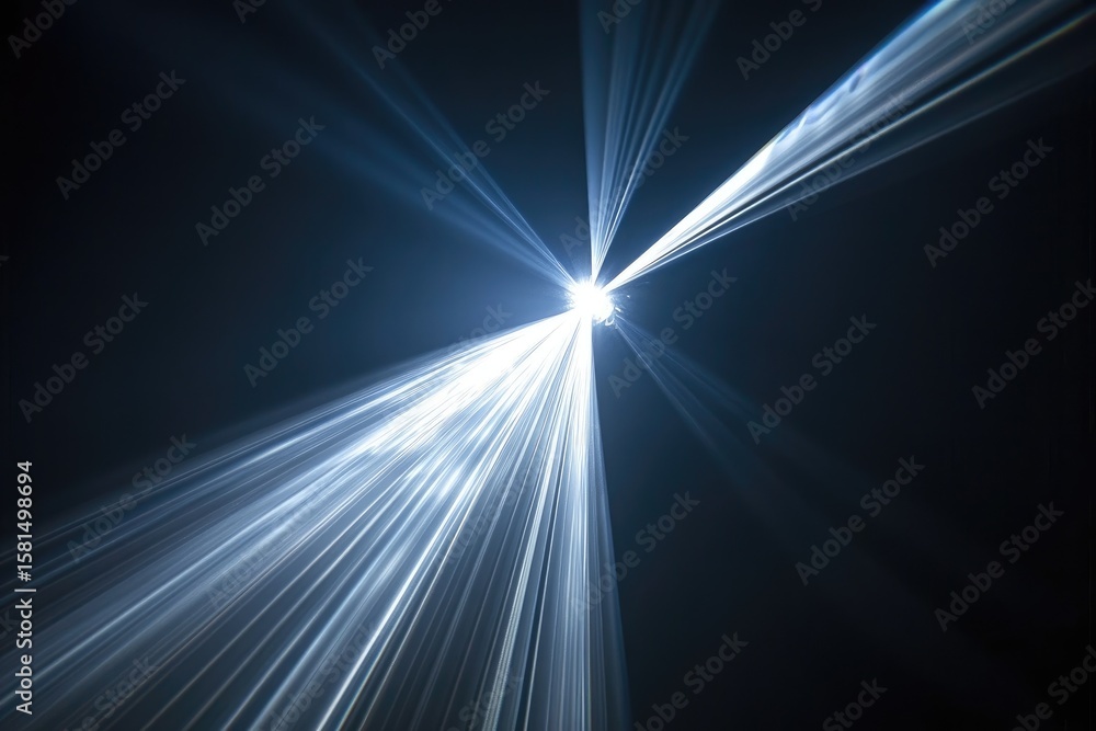 Obraz premium Light beams radiating from a central point, illuminating dark space