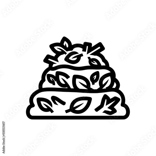 Stacked food with leaves and herbs on a plate