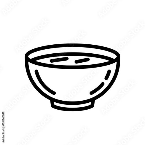 Bowl of soup with noodles on black background