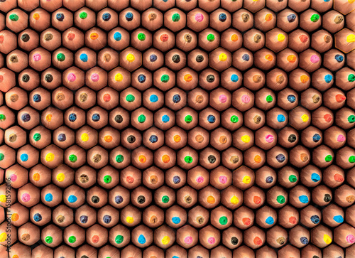 Colorful Close-Up of Assorted Pencil Tips Arranged in a Hexagonal Pattern