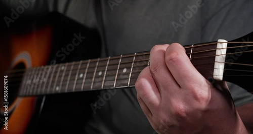 Closeup of Playing Guitar Chords