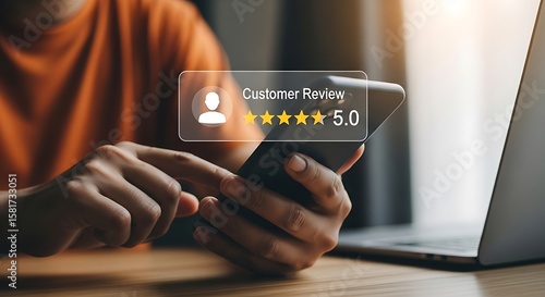 Person using smartphone showing five star customer review rating on screen gold stars digital feedback mobile app