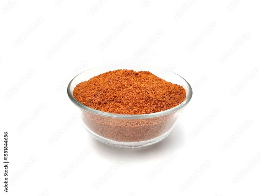Chili powder in bowl on white background Chili powder in bowl on white background