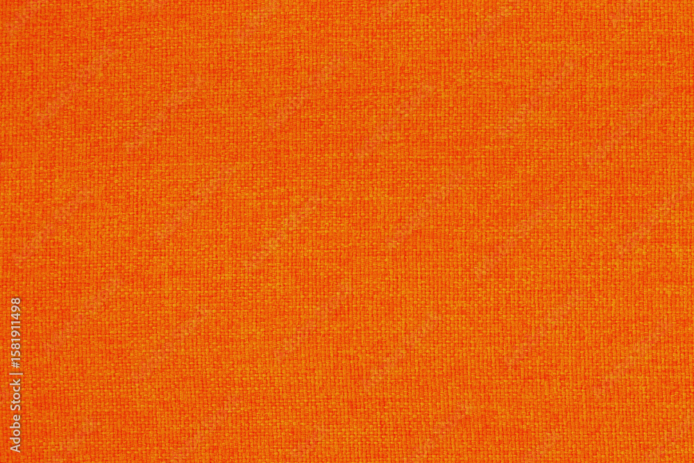 Fototapeta premium Orange fabric cloth texture background, seamless pattern of natural textile.