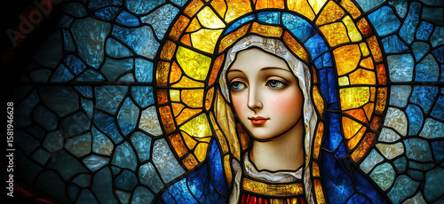 Stained glass depiction of Virgin Mary with vibrant colors and intricate details.
