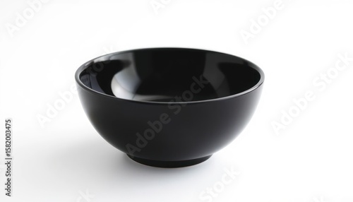Black ceramic bowl on a white background perfect for food photography