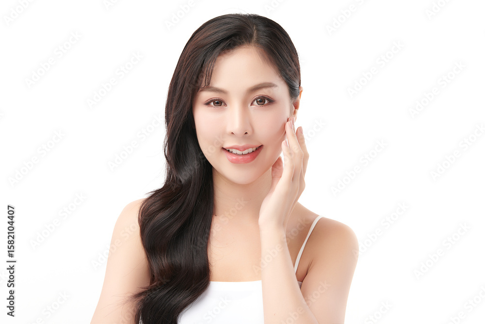 A beautiful young Asian woman with clean, fresh skin against a white background. Skincare, facial treatment, cosmetology, beauty, and spa. An elegant portrait of an Asian woman. A beautiful young Asian woman with clean, fresh skin against a white background. Skincare, facial treatment, cosmetology, beauty, and spa. An elegant portrait of an Asian woman.