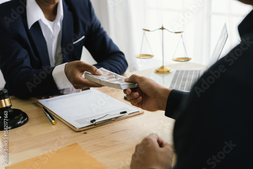 Bilde på lerret Lawyer giving advice and handing over cash during a legal meeting, symbolizing f