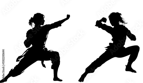 Two woman silhouette exercising karate or martial arts isolated on white background.
