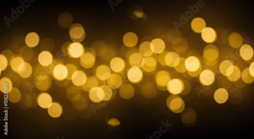 Golden bokeh lights. Blurred yellow circles. Dark background. Glowing dots. Abstract texture. Bokeh effect. Light spots. Festive atmosphere. Sparkling lights.