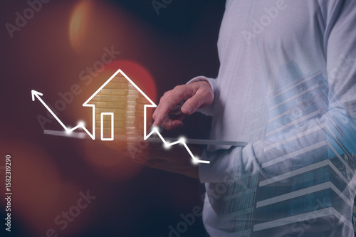 real estate investment concept man hand using tablet working on real estate growth graph property value new home for the family, home search, land price, property tax