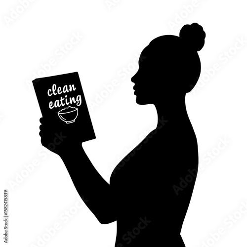 Silhouette of woman holding clean eating book, health and wellness copyspace