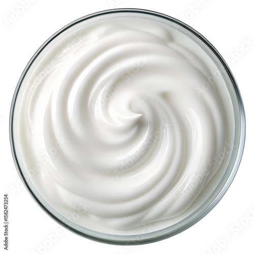 Swirl of white cream in a glass bowl isolated on transparent background