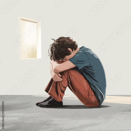 Young person sitting alone in a room with head down in despair