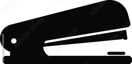 Black silhouette of a stapler, office supply for fastening papers.