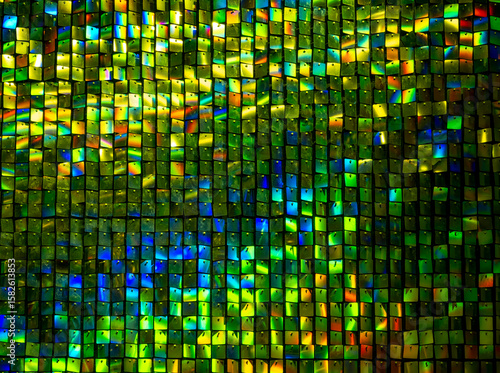 Wind Driven Shimmer Wall, Square metal reflectors shining