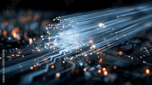Glowing fiber optic cables transmitting data over electronic circuit board